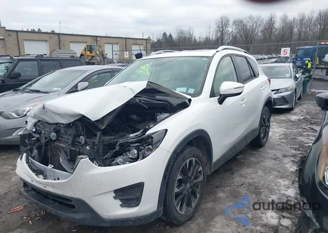 2016 Mazda Cx-5 Grand Touring z USA, uszkodzony, nr VIN JM3KE4DY2G0607584